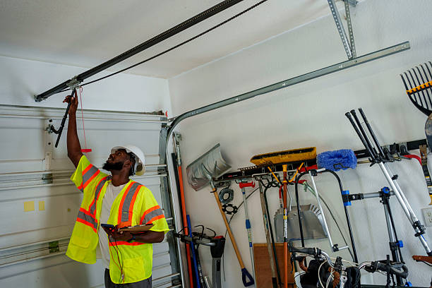 Professional Garage Door technician working in Delphi, IN